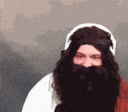a man with a beard is wearing a crown of thorns on his head