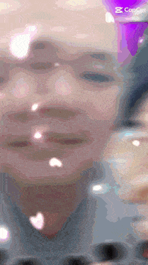 a close up of a person 's face with the word capcut in the upper right corner