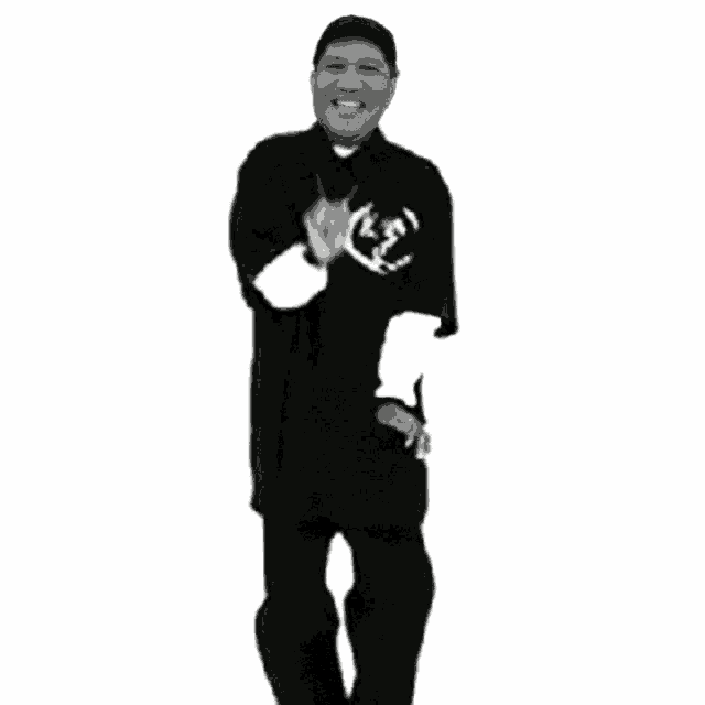 a black and white photo of a man wearing a t-shirt that says ' e ' on it