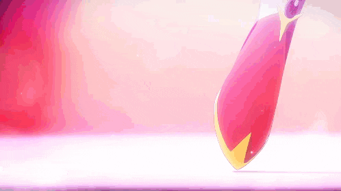 a close up of a red flower petal with a yellow center on a pink surface .