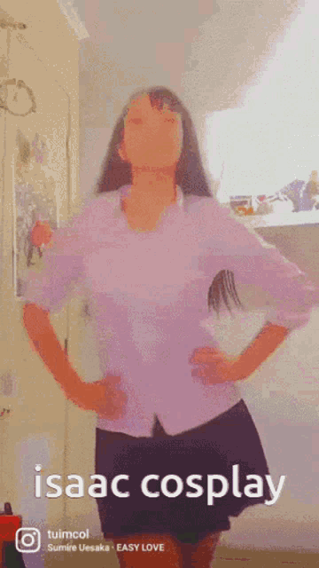 a girl in a white shirt and black skirt is dancing with the words isaac cosplay above her
