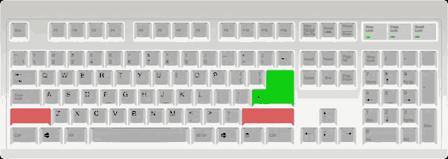 a keyboard with a green key in the middle of the keyboard