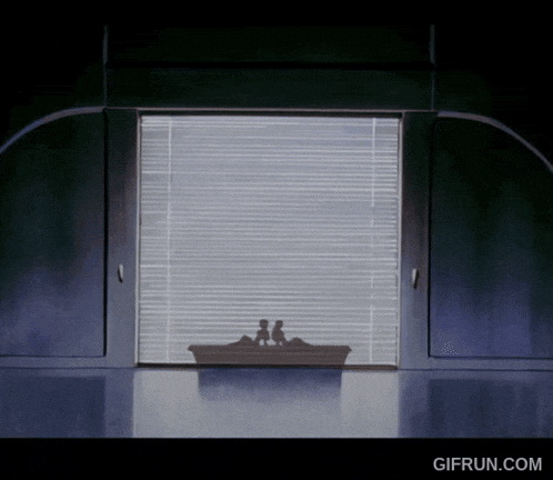 a gif from gifrun.com shows a silhouette of two people looking out a window