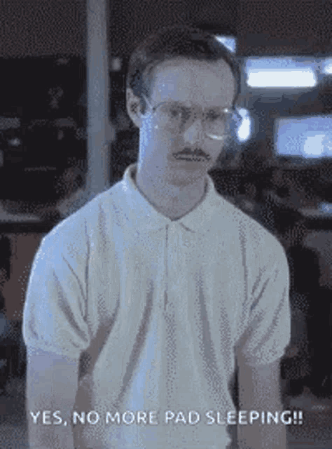 a man with glasses and a mustache is wearing a white shirt and a white polo shirt .