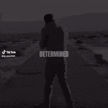 a black and white photo of a man standing on a road with the word resilient written on it .