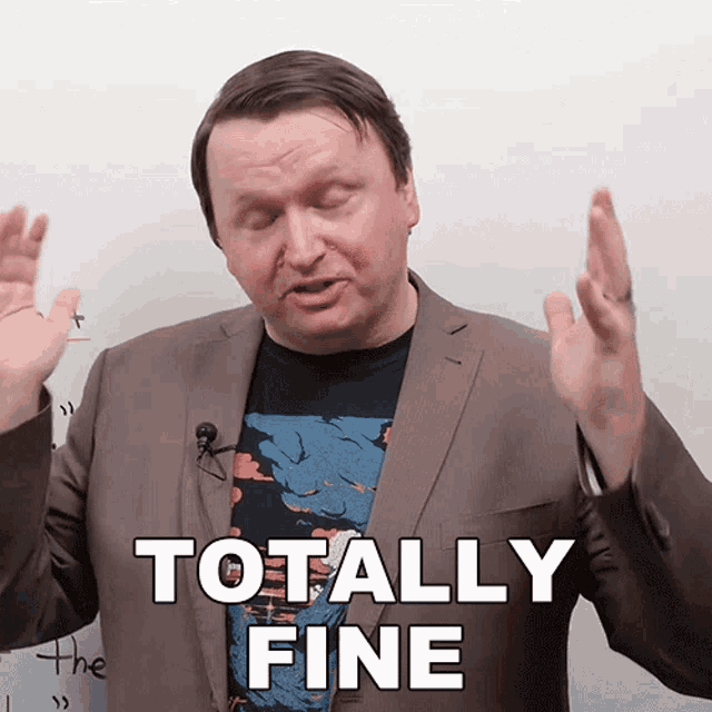 a man in a suit says totally fine