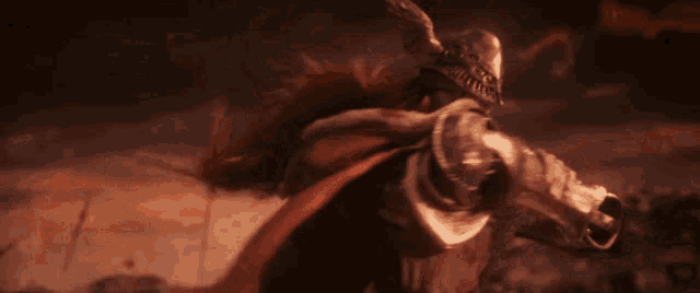 a monster with a sword is fighting another monster in the dark