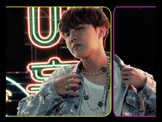 a neon sign with the letter u on it