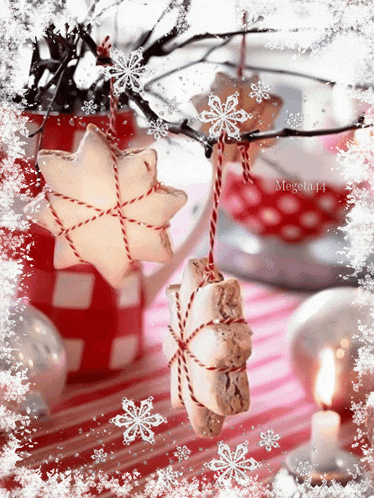 christmas decorations hanging from a tree with megeta44 written on the bottom