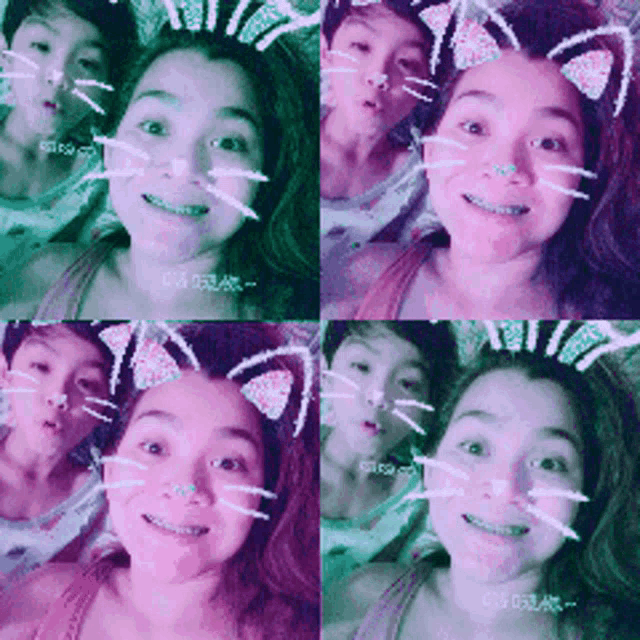 a girl with cat ears and a boy with cat ears on their faces