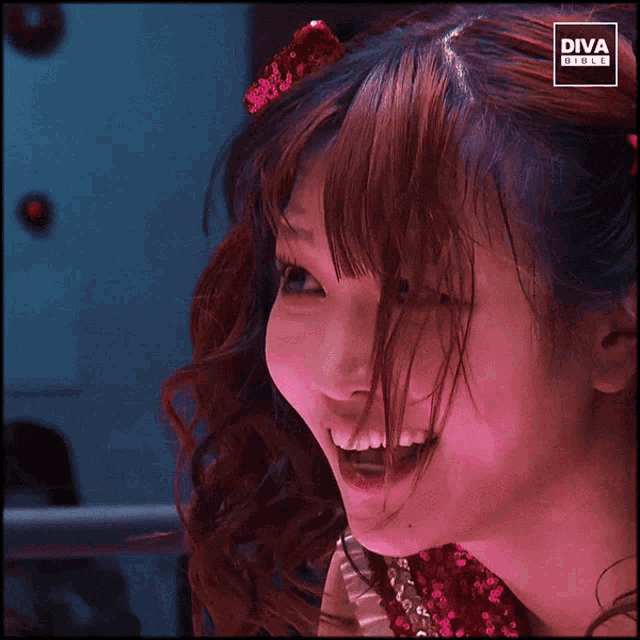 a woman with diva girls written on the corner of her face