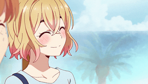 a girl with blonde hair and blue eyes is looking at the camera