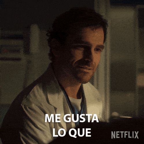 a man in a lab coat says " me gusta lo que " in spanish