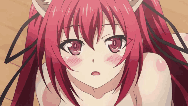a close up of a girl with red hair and a cat ear
