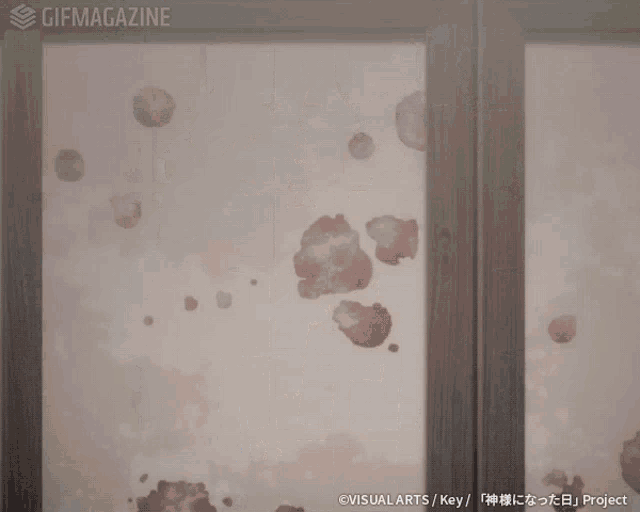a gif of a person giving each other a high five with the gifmagazine logo in the corner