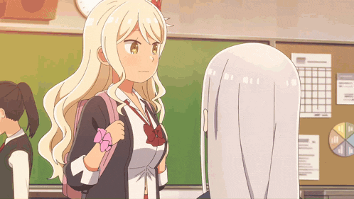 a girl with blonde hair is standing next to another girl with white hair