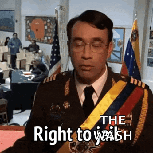 a man in a military uniform with a sash around his neck says the right to wash .