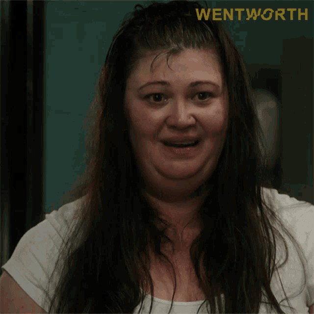 a woman is laughing with the word wentworth on the bottom