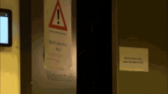 a sign that says videostudio is on a door