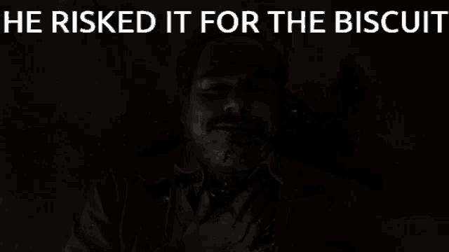 a black and white photo of a man with the words he risked it for the biscuit above him