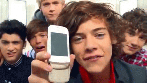 Harryyyyy GIF - One Direction Harry Styles Phone GIFs