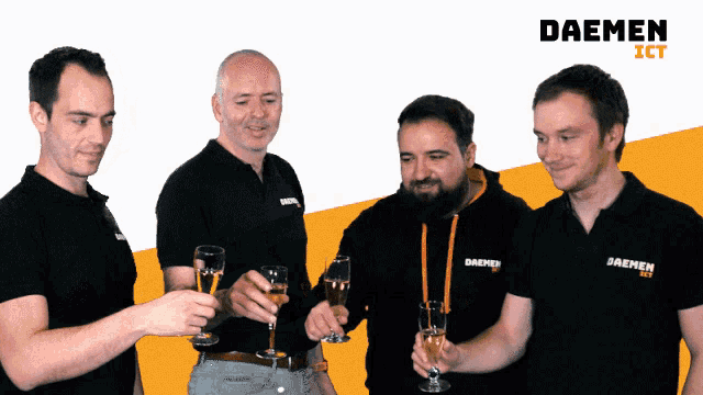 a group of men wearing black shirts with daemen ict on the front