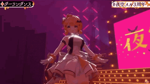 a girl in a white dress is dancing on a stage in front of a large screen with chinese writing on it