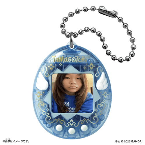 a blue tamagotchi with a picture of a girl in it