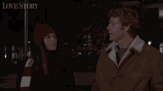 a man and a woman are standing next to each other and the words love story are on the bottom