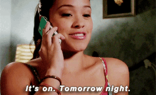 a woman talking on a cell phone with the words it 's on tomorrow night