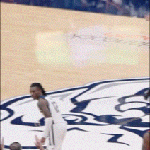 a basketball player in a white jersey with the number 23 on it