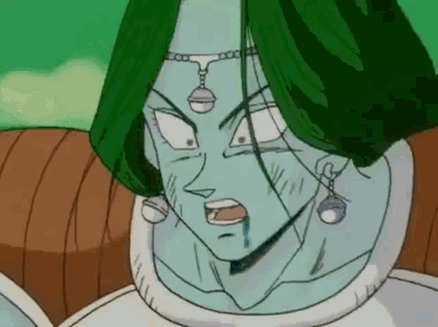 a close up of a cartoon character with green hair and earrings .