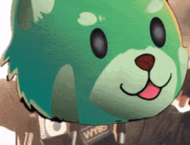 a green teddy bear with a badge that says wyrd