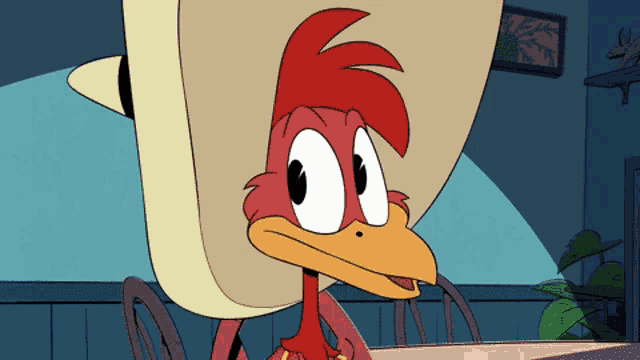 a cartoon rooster with a sombrero on his head
