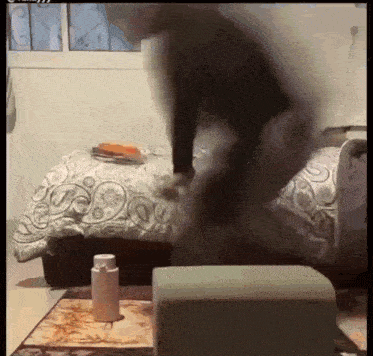 a bottle of lotion sits on a rug in a bedroom
