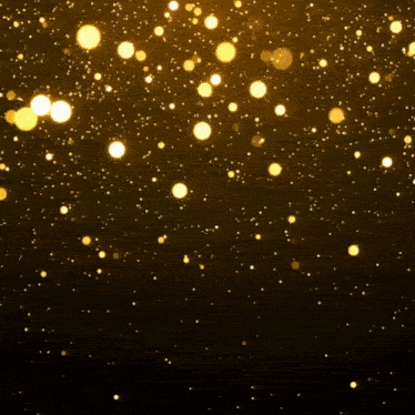 a picture of a man and a woman in a frame with gold sparkles