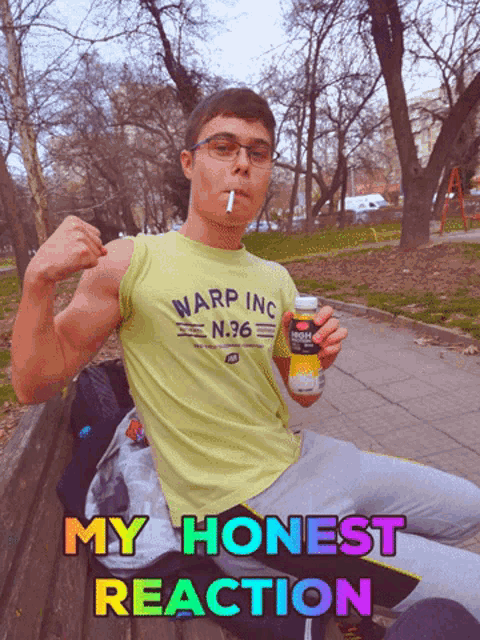 a man in a warp inc shirt is smoking a cigarette