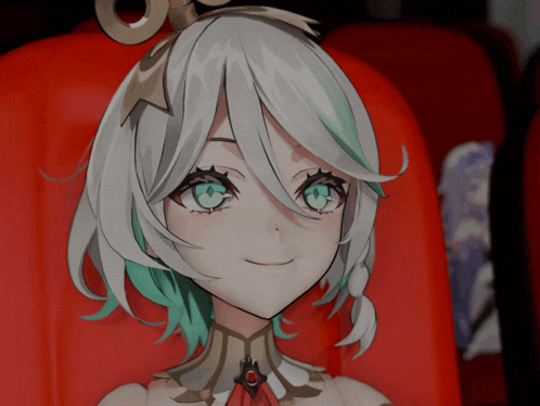 a girl with white hair and green eyes is sitting on a red chair