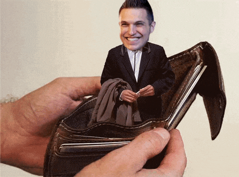 a person is holding a wallet with a picture of a man in it