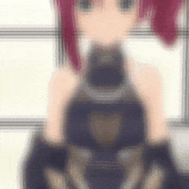 a blurred image of a girl with red hair