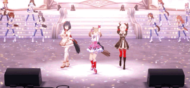 a group of anime girls are on a stage