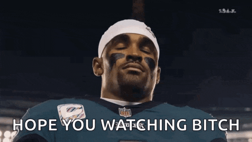 a football player with hope you watching bitch written on the bottom