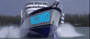 a boat with the word bizzard on the side is floating on the water .