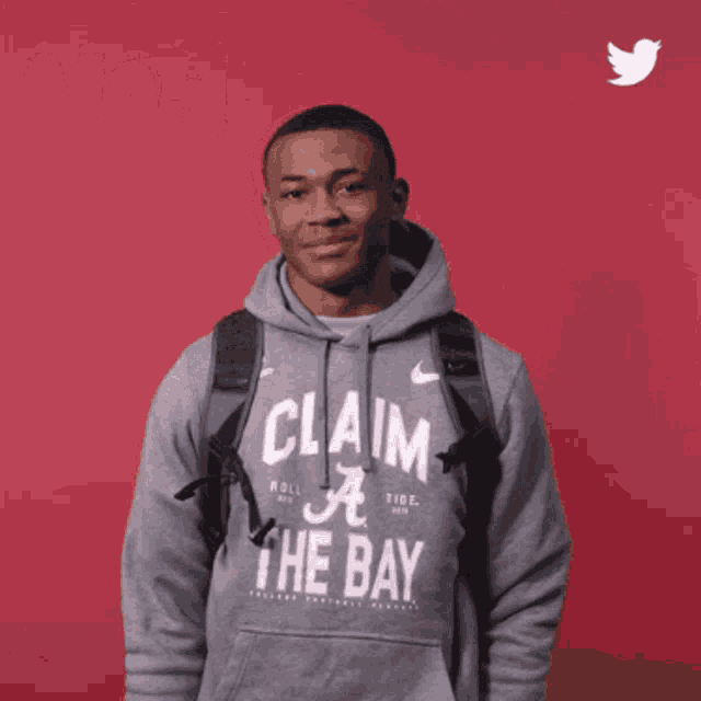 a man wearing a hoodie that says nah fam on it
