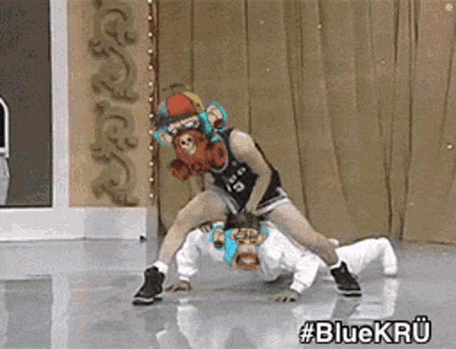 a person wearing a monkey mask is doing push ups