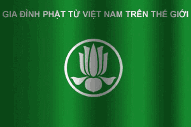 a green background with a white flower in the center