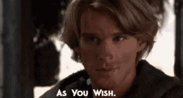 a close up of a man 's face with the words `` as you wish '' written next to him .