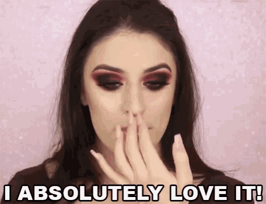 a woman covering her nose with her hand with the words i absolutely love it behind her