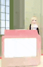 a doll is standing in front of a pink box
