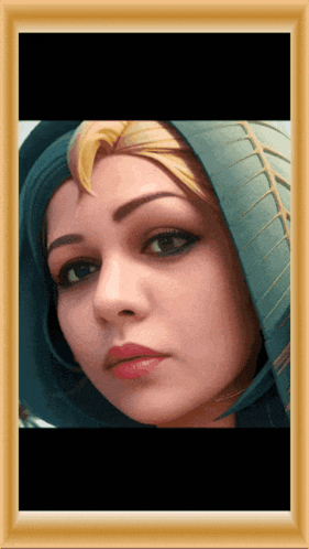 a picture of a woman with a scarf around her head